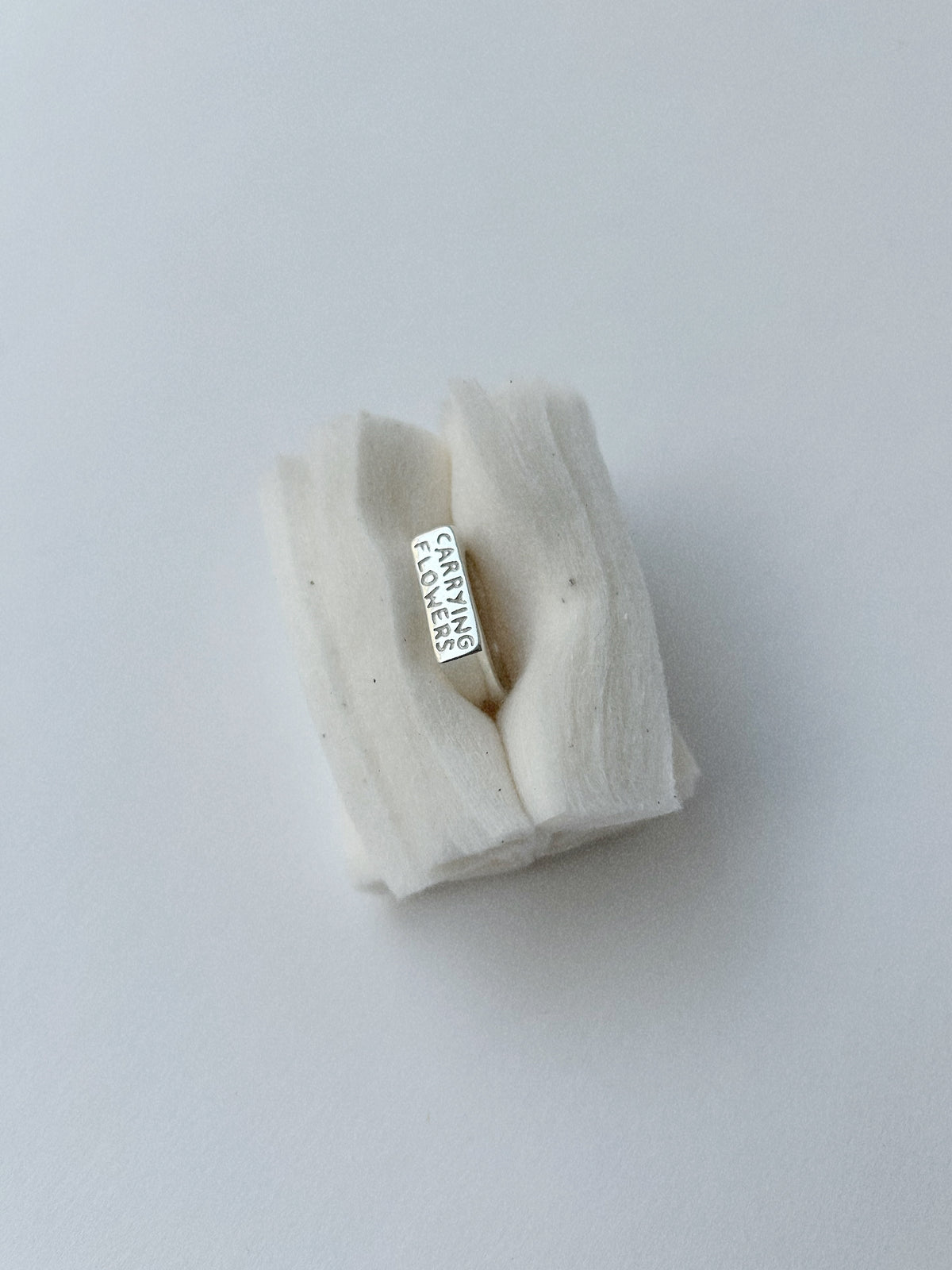 CARRYING FLOWERS – RING