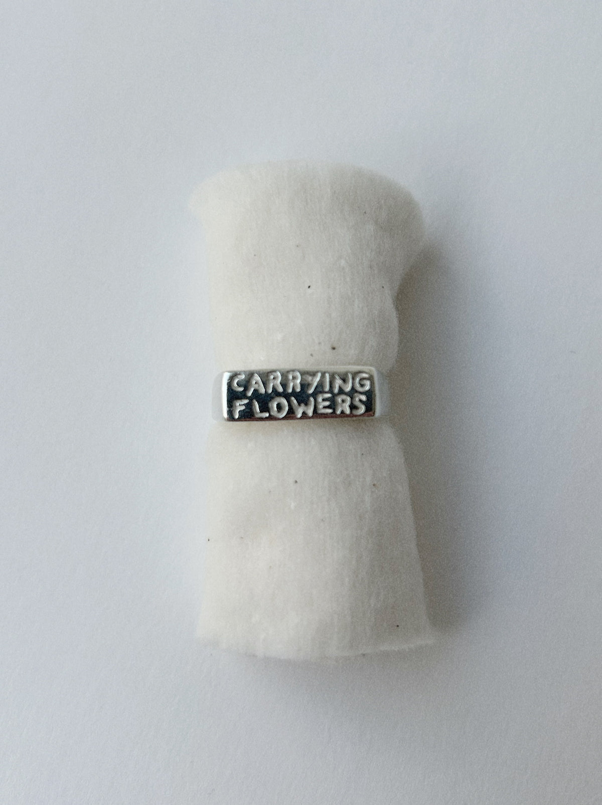 CARRYING FLOWERS – RING