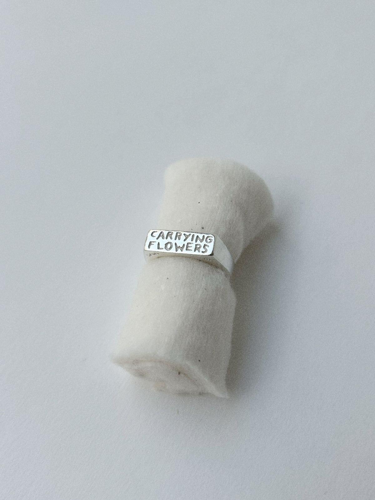 CARRYING FLOWERS – RING