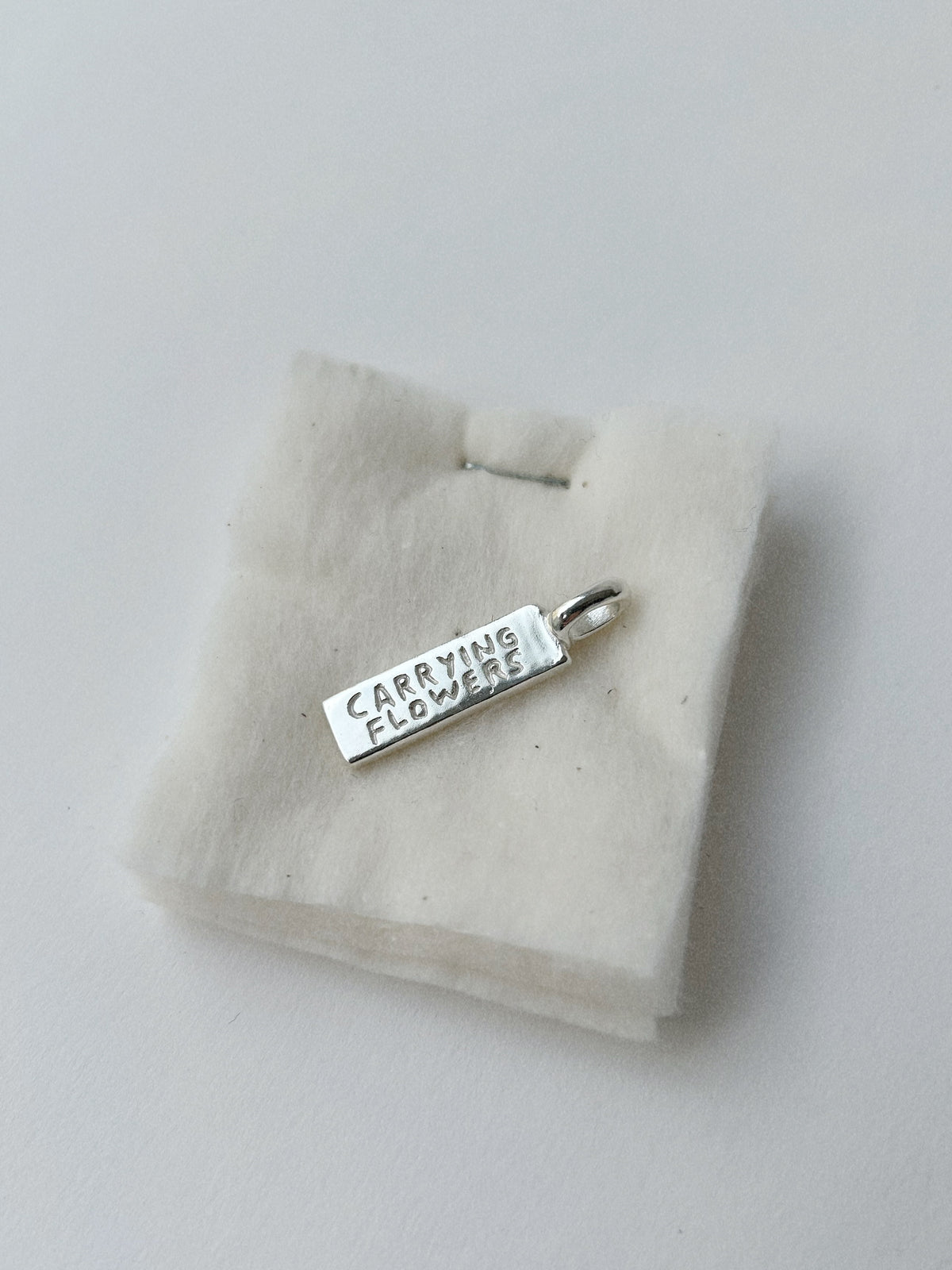 CARRYING FLOWERS – PENDANT
