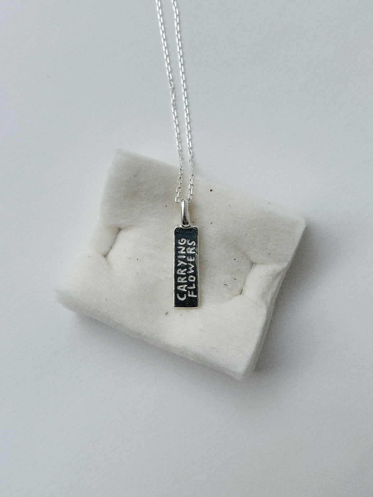 CARRYING FLOWERS – PENDANT