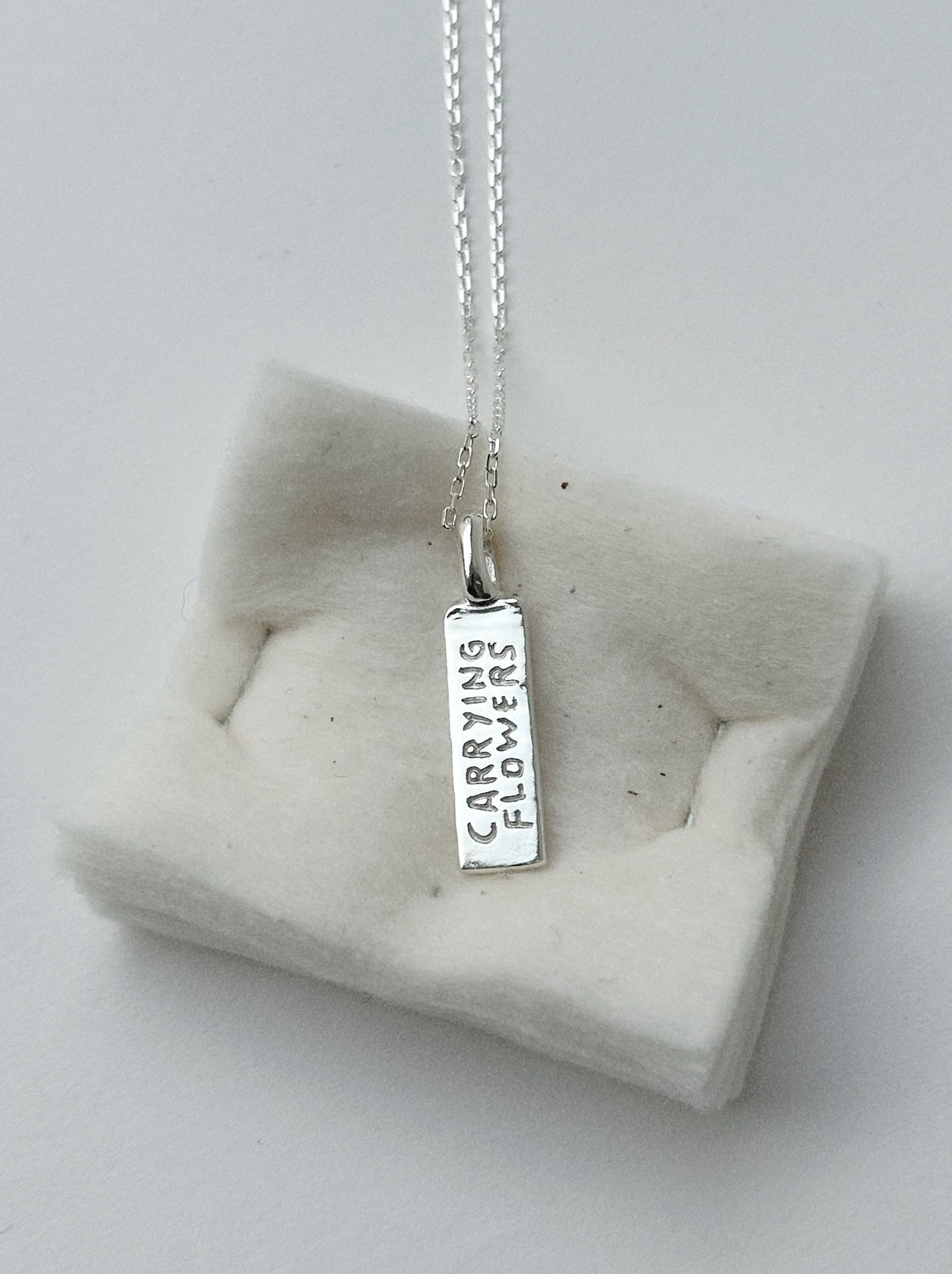 CARRYING FLOWERS – PENDANT