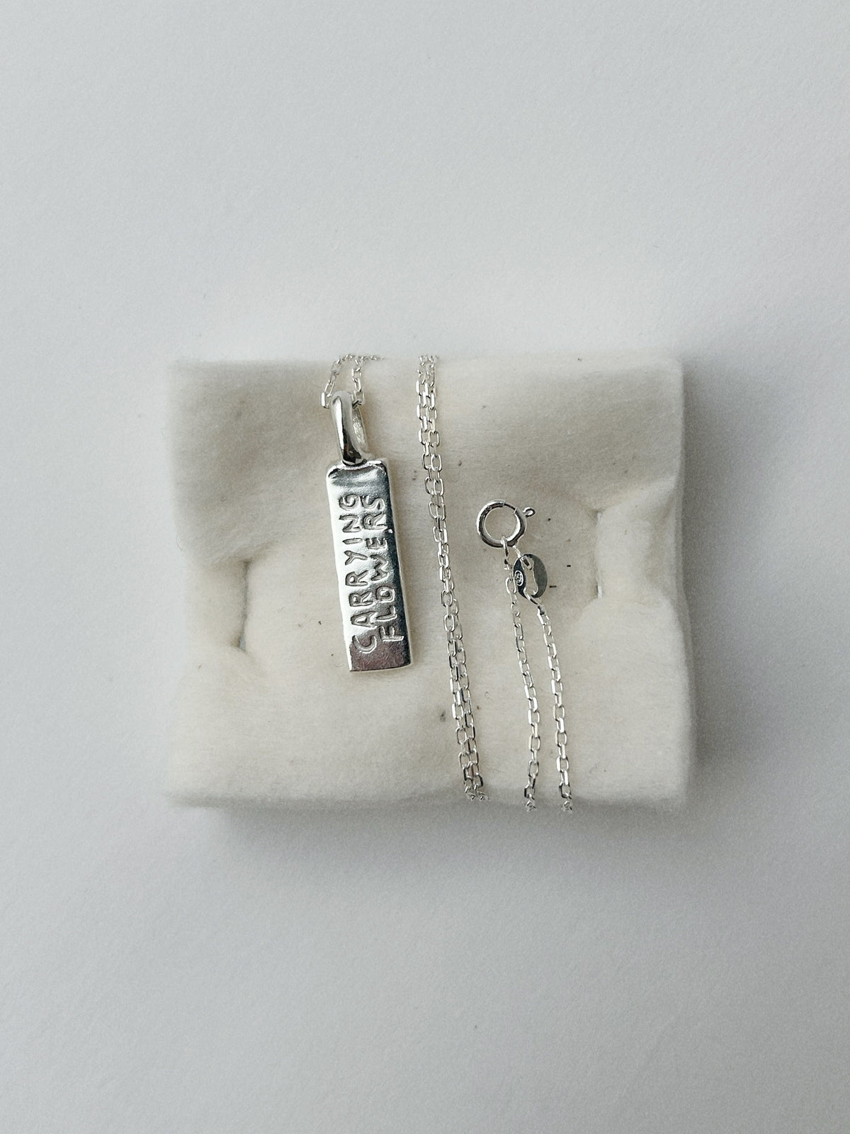 CARRYING FLOWERS – PENDANT