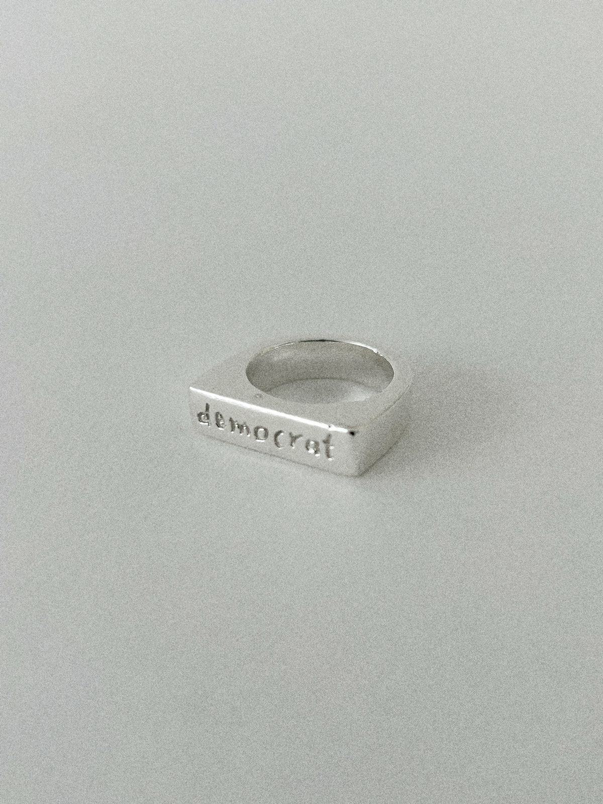 'DEMOCRAT' SIGNET RING (WRITTEN)