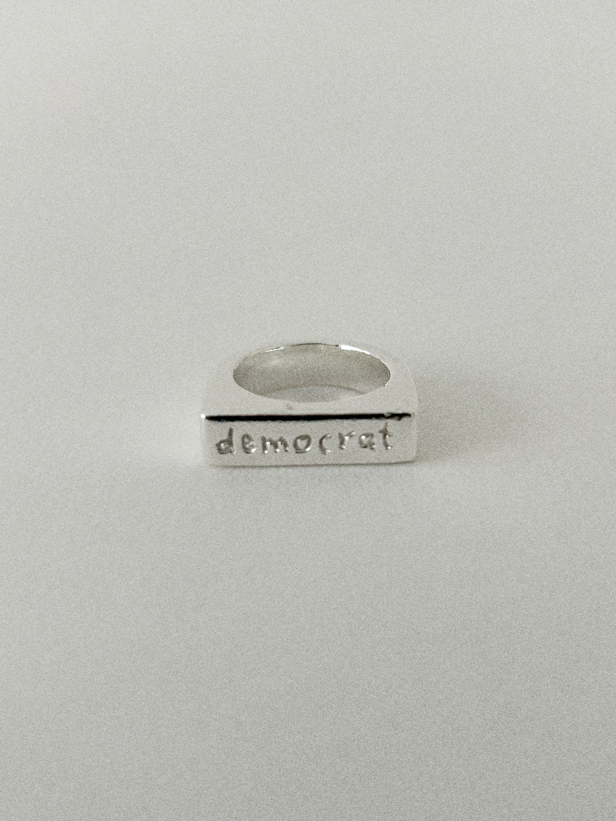 'DEMOCRAT' SIGNET RING (WRITTEN)
