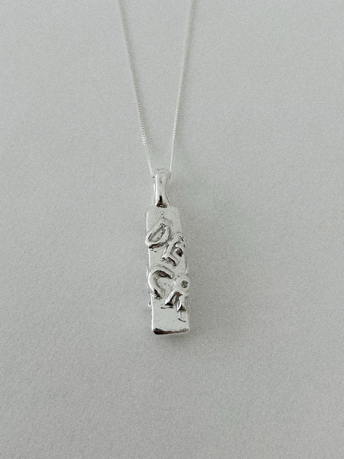 'DEMOCRAT' PENDANT (MOLTEN)