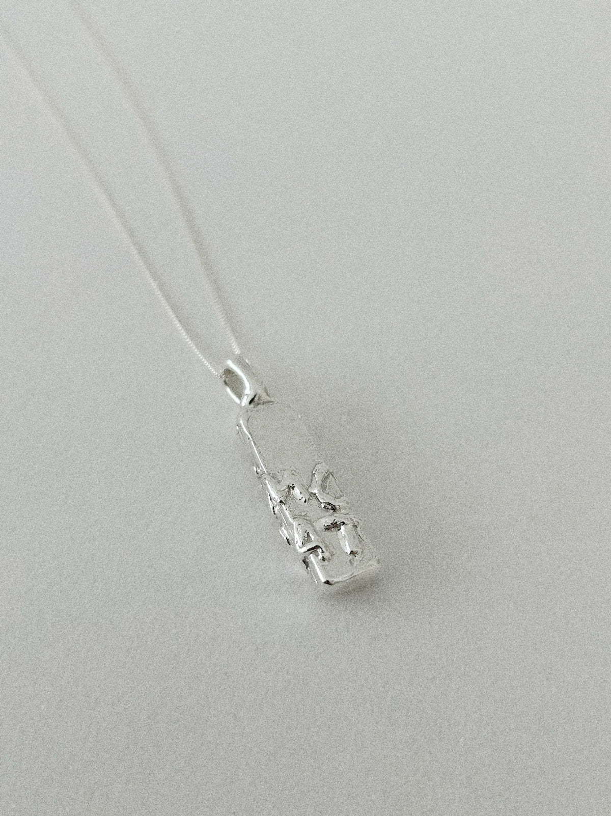 'DEMOCRAT' PENDANT (MOLTEN)