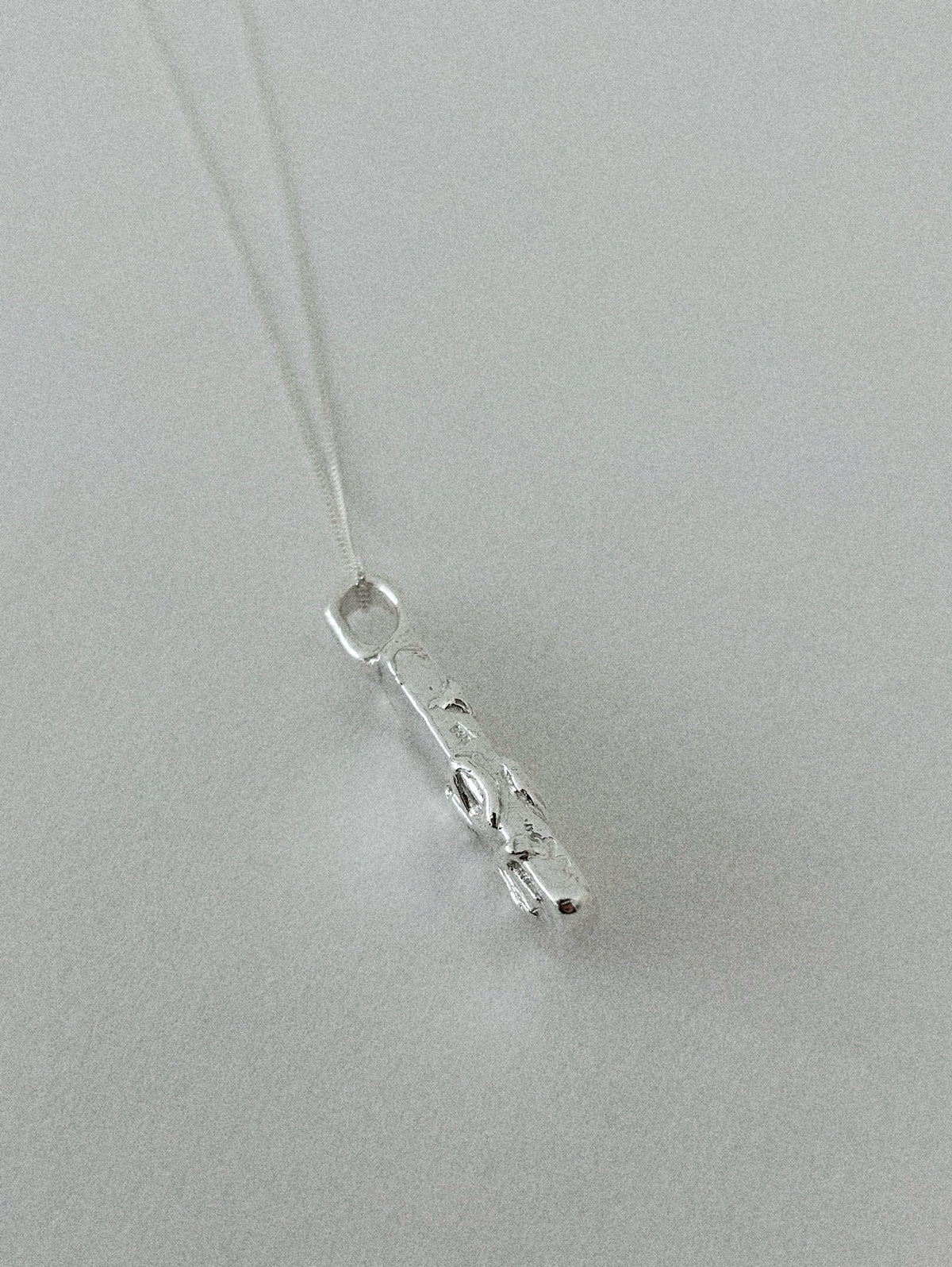 'DEMOCRAT' PENDANT (MOLTEN)