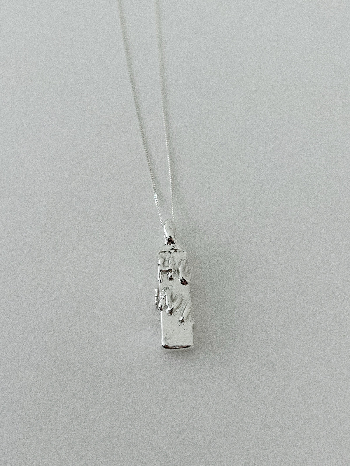 'HUMANIST'  PENDANT (MOLTEN)