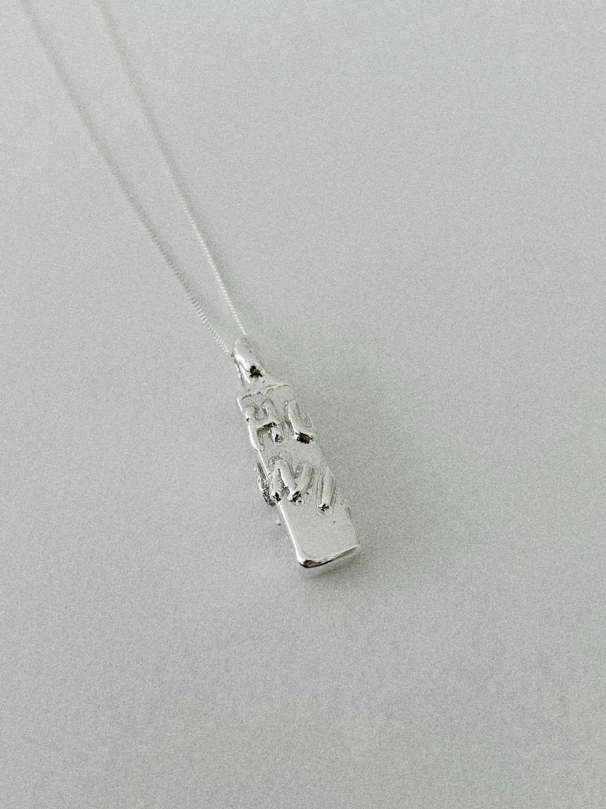'HUMANIST'  PENDANT (MOLTEN)