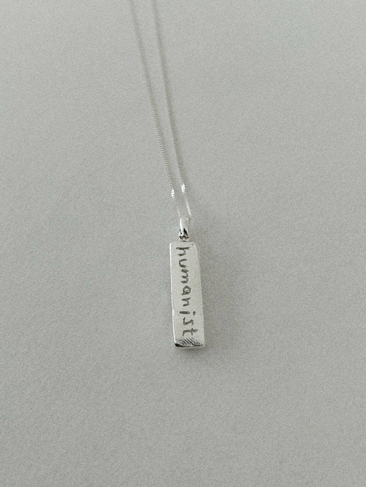 'HUMANIST' PENDANT I (WRITTEN)