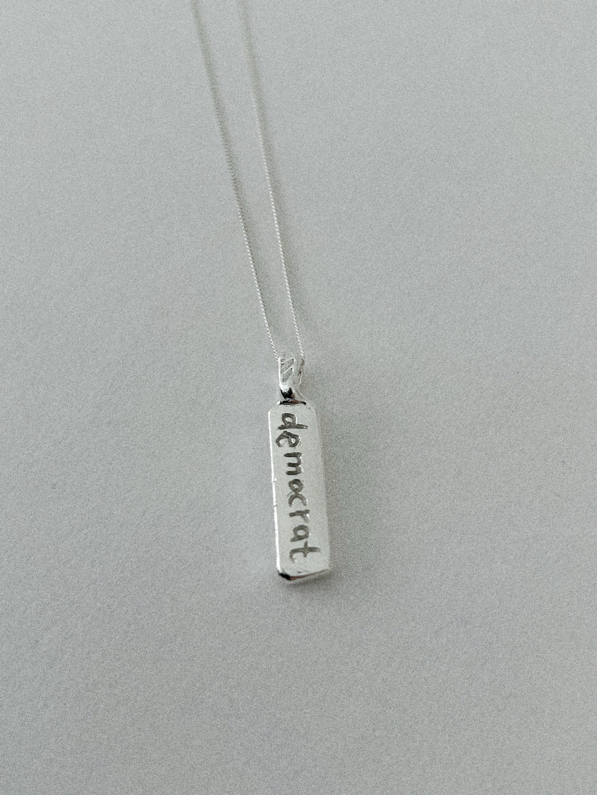 'DEMOCRAT' PENDANT I (WRITTEN)