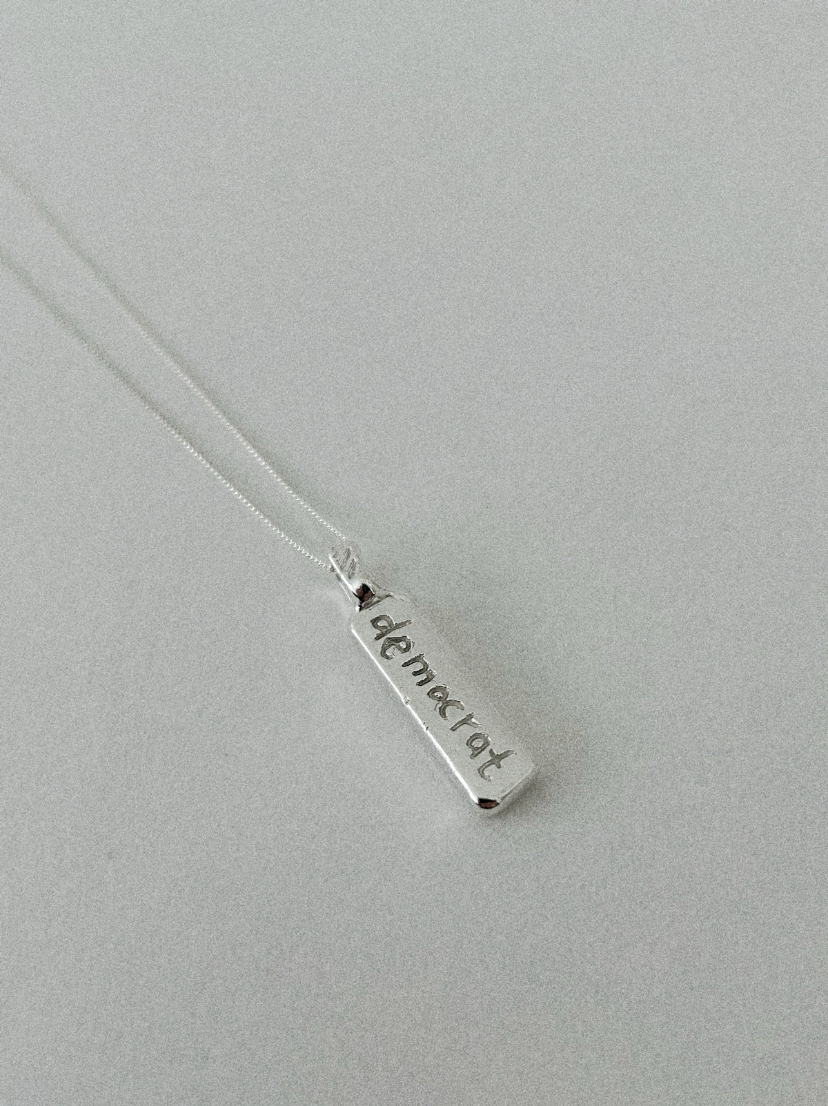 'DEMOCRAT' PENDANT I (WRITTEN)