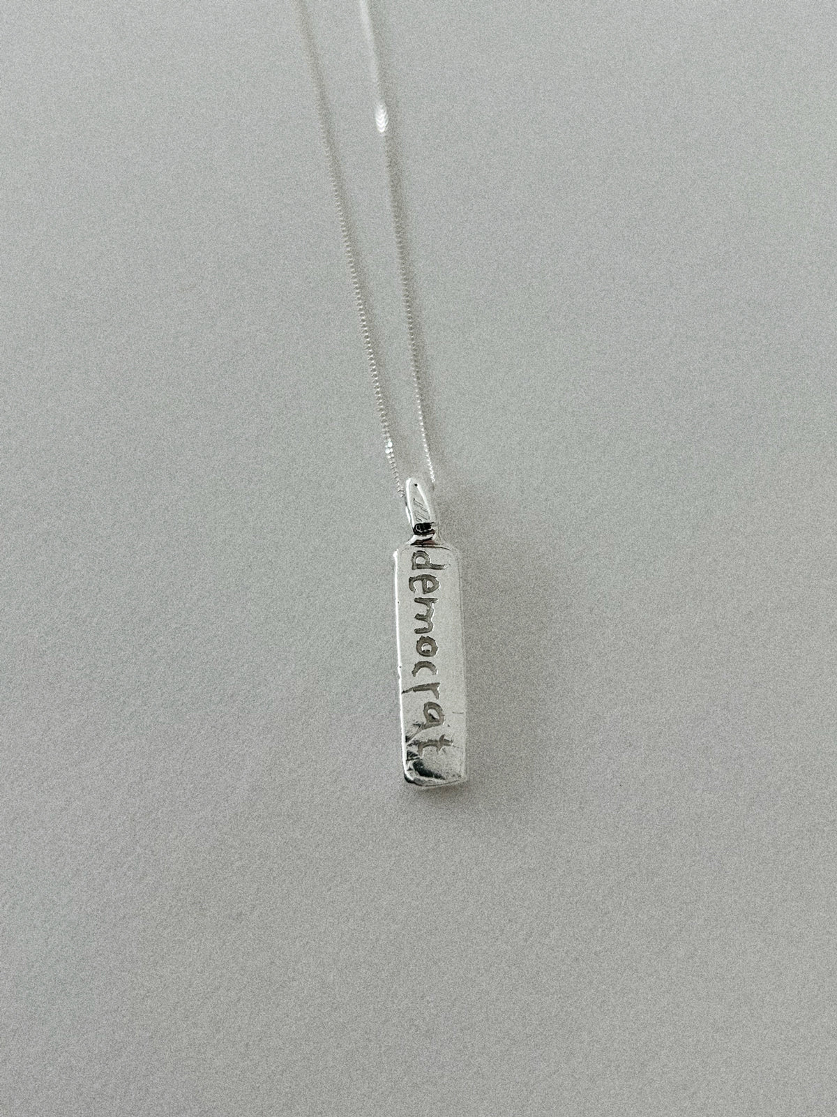 'DEMOCRAT' PENDANT II (WRITTEN)
