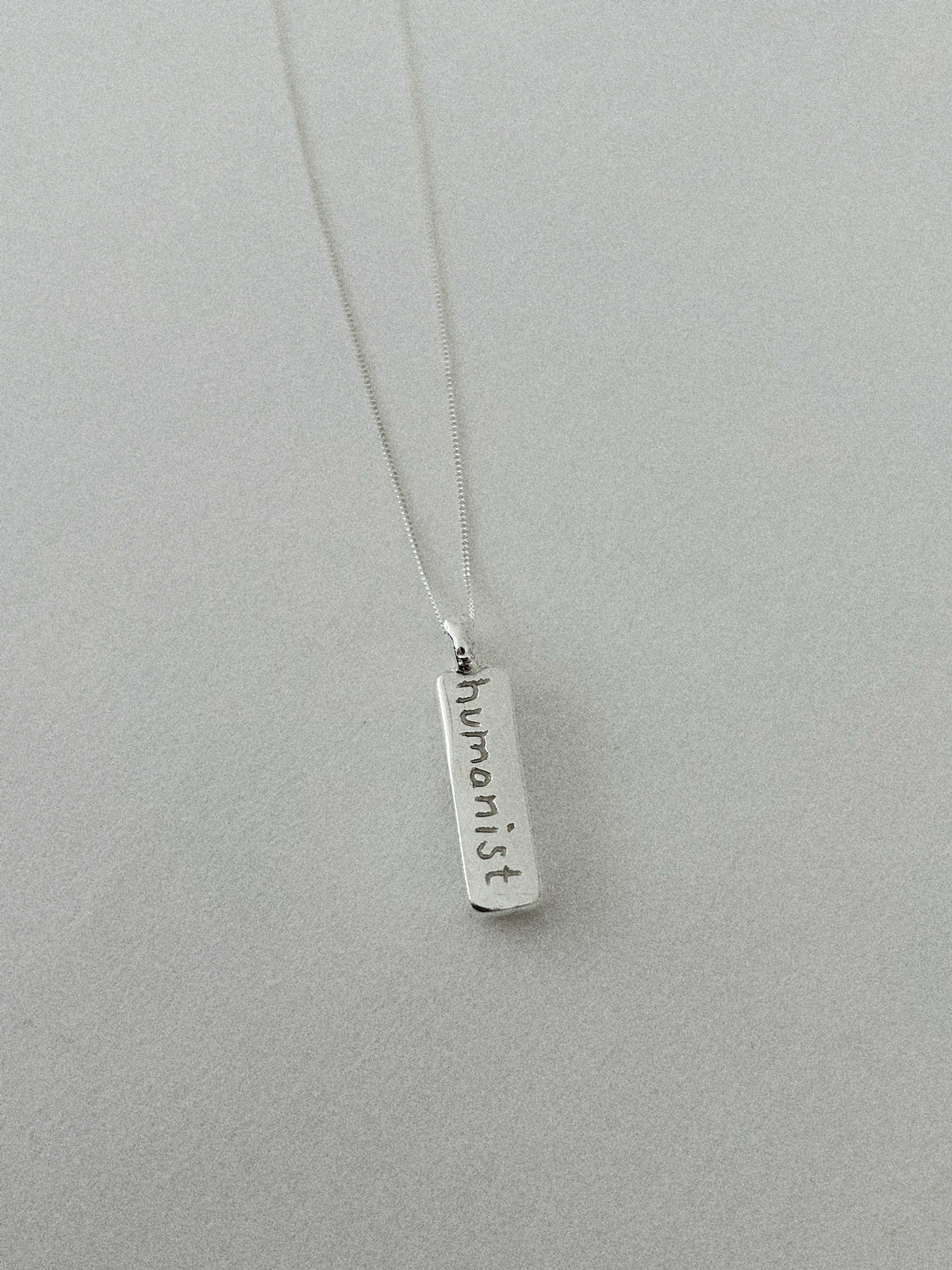 'HUMANIST' PENDANT II (WRITTEN)