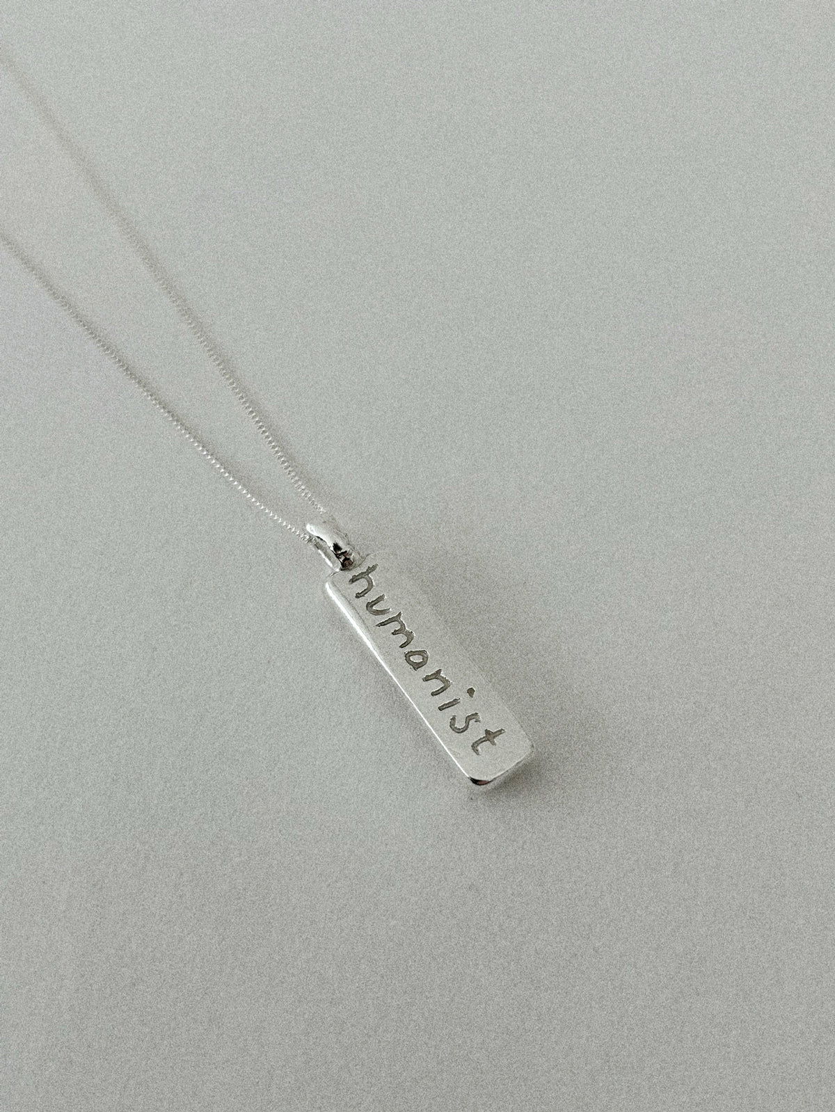'HUMANIST' PENDANT II (WRITTEN)