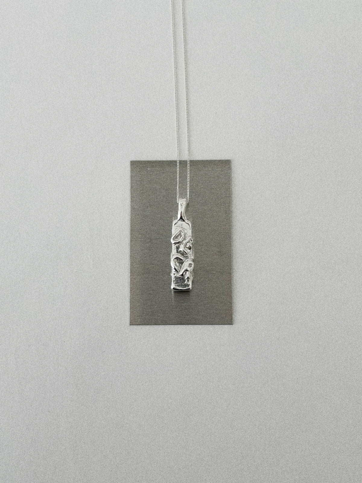 'DEMOCRAT' PENDANT (MOLTEN)