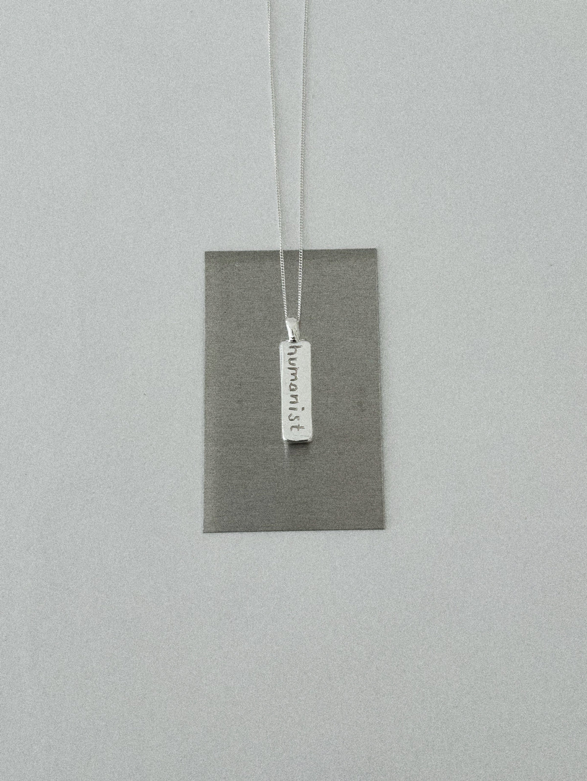 'HUMANIST' PENDANT II (WRITTEN)