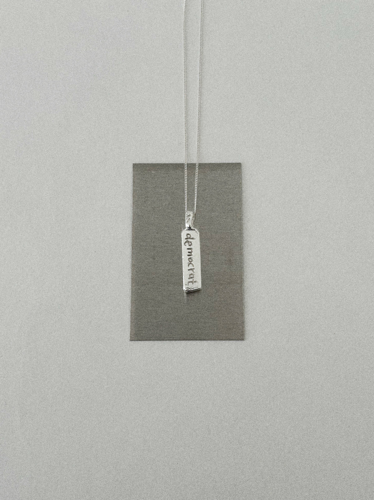 'DEMOCRAT' PENDANT I (WRITTEN)