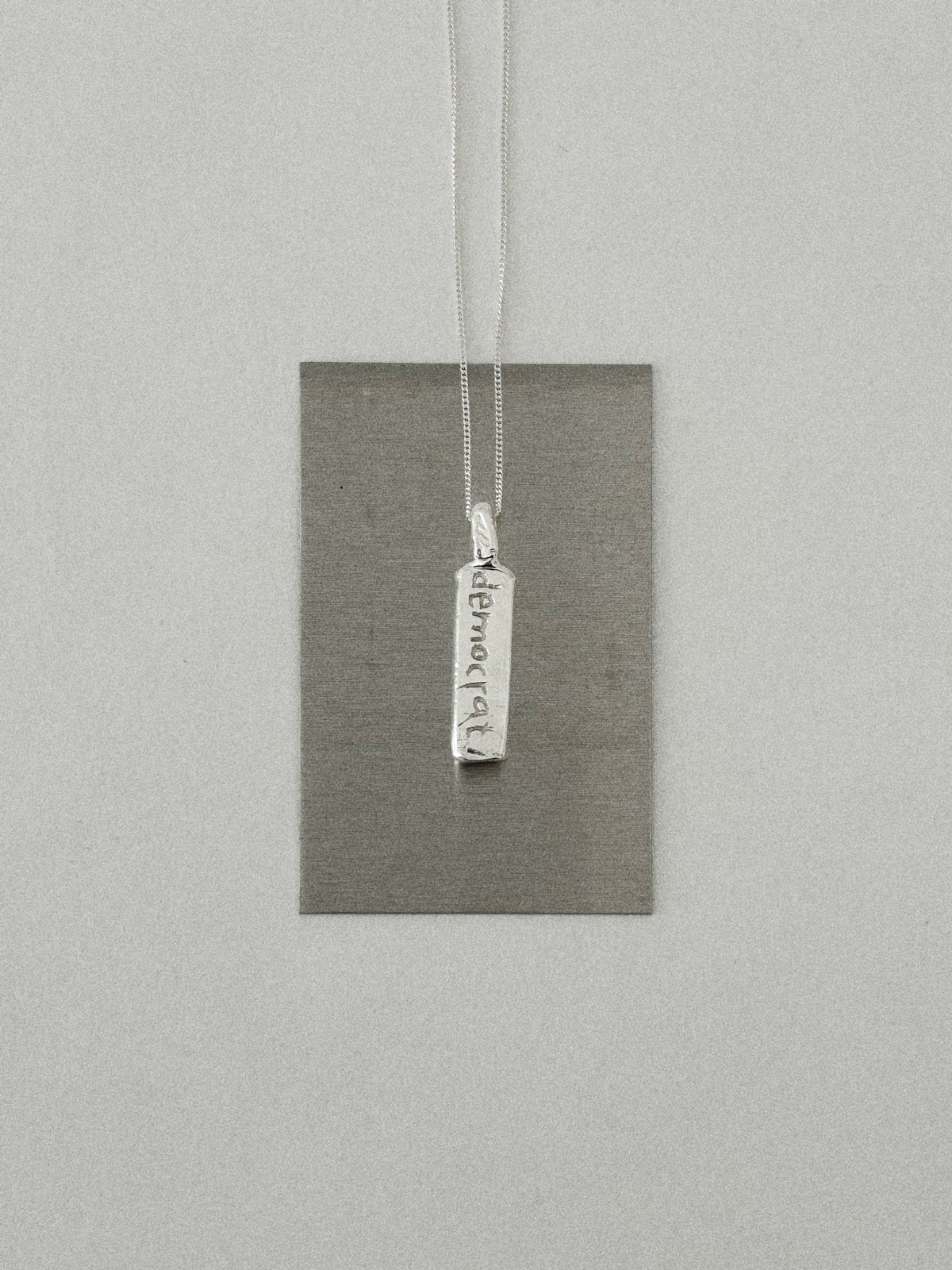 'DEMOCRAT' PENDANT II (WRITTEN)