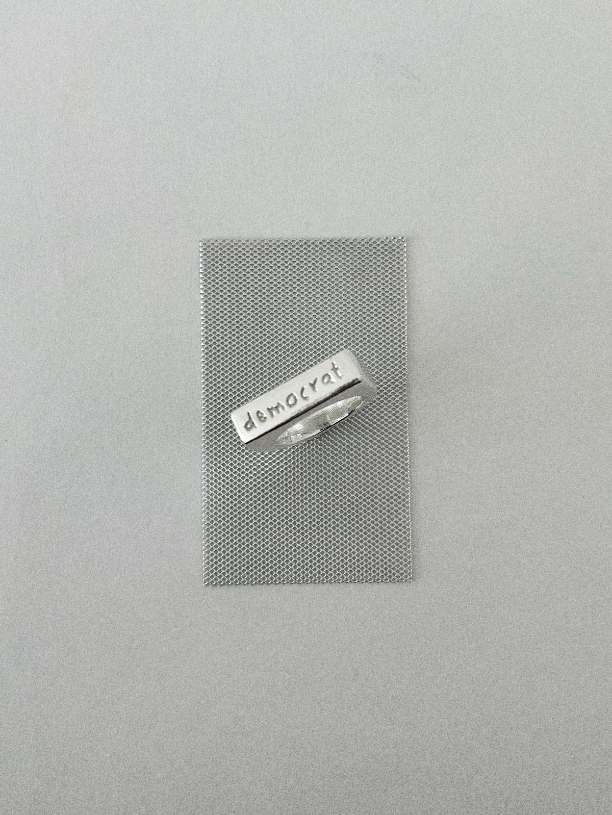 'DEMOCRAT' SIGNET RING (WRITTEN)