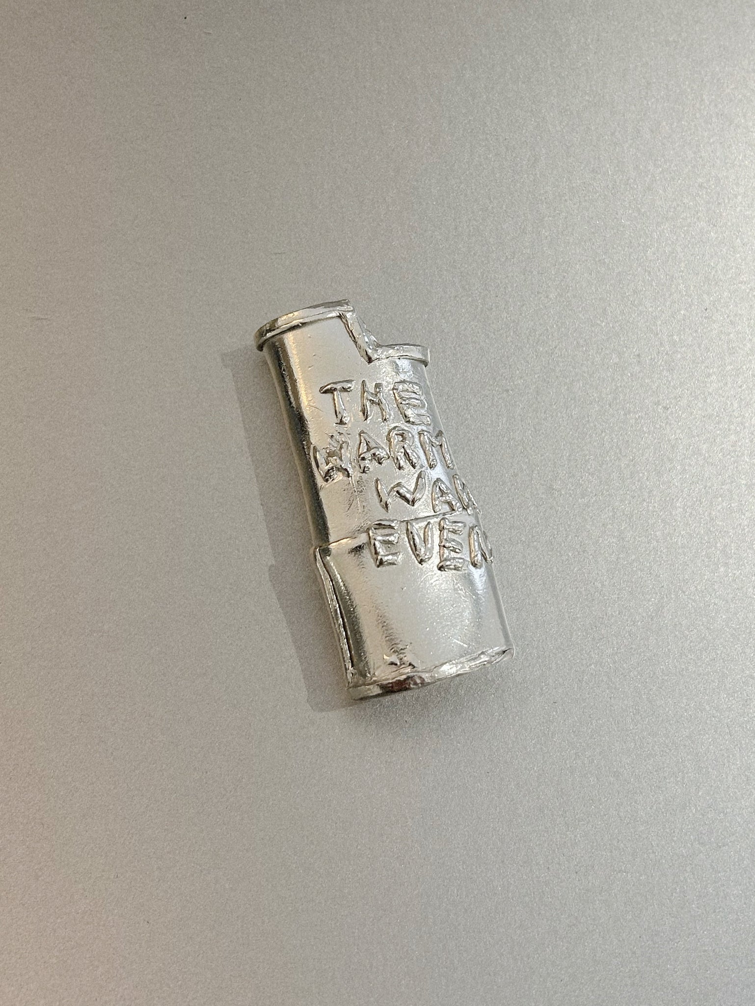 THE WARM WARM EVENING – LIGHTER CASE