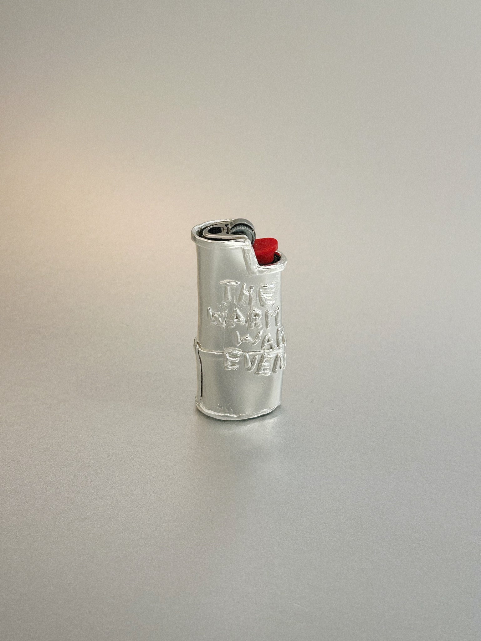 THE WARM WARM EVENING – LIGHTER CASE