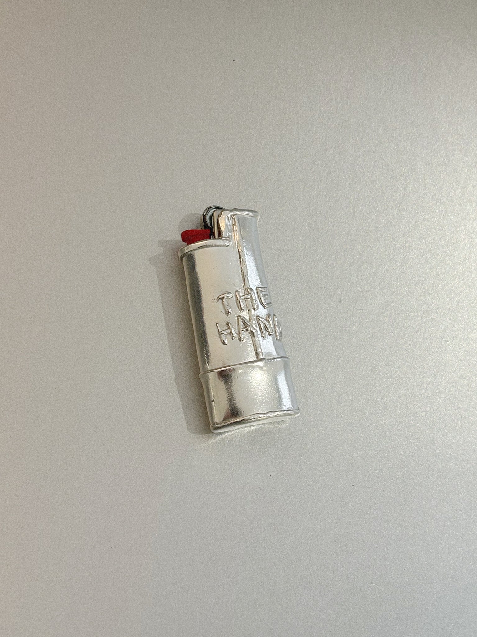 THE HAND – LIGHTER CASE
