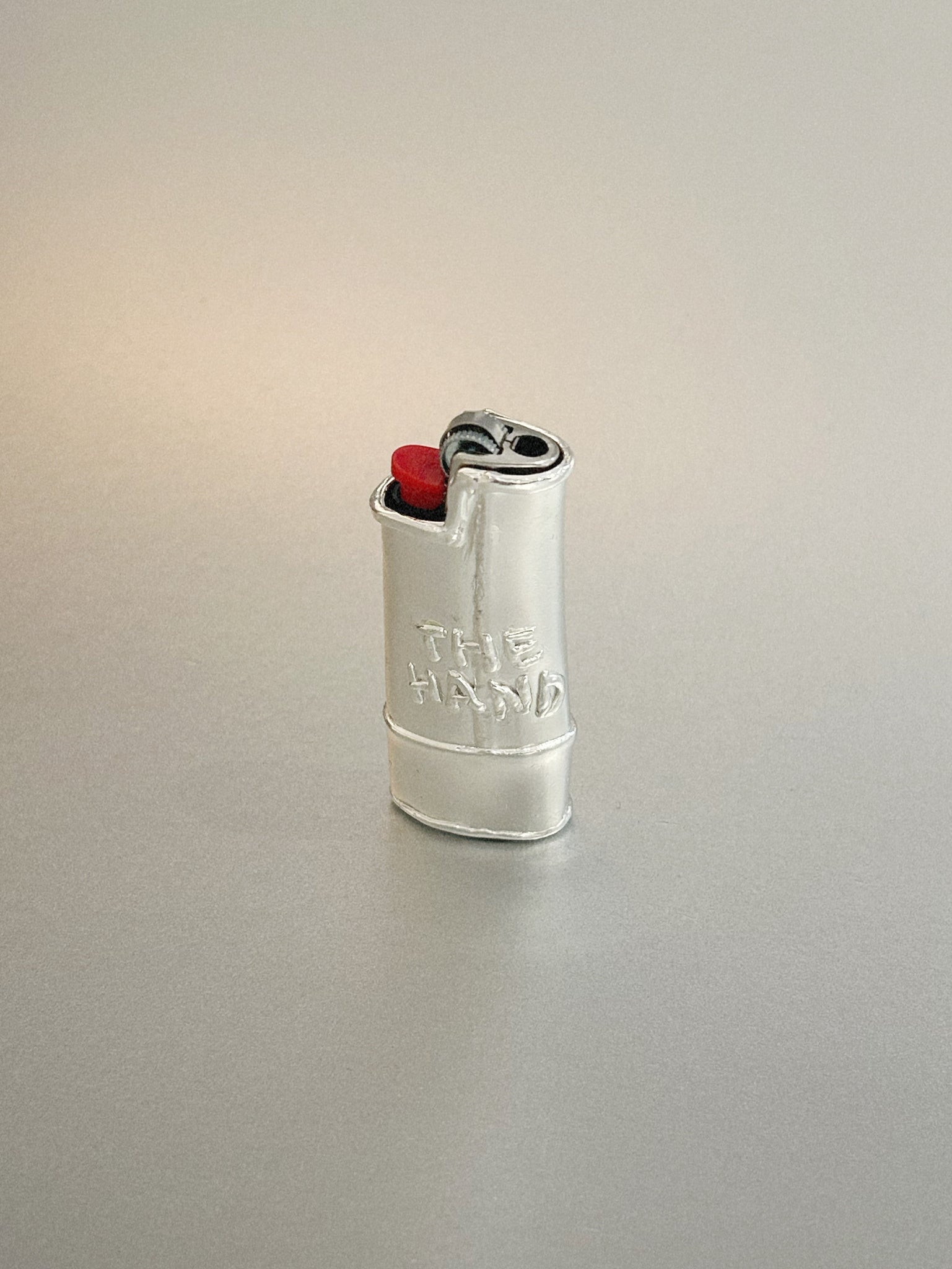 THE HAND – LIGHTER CASE
