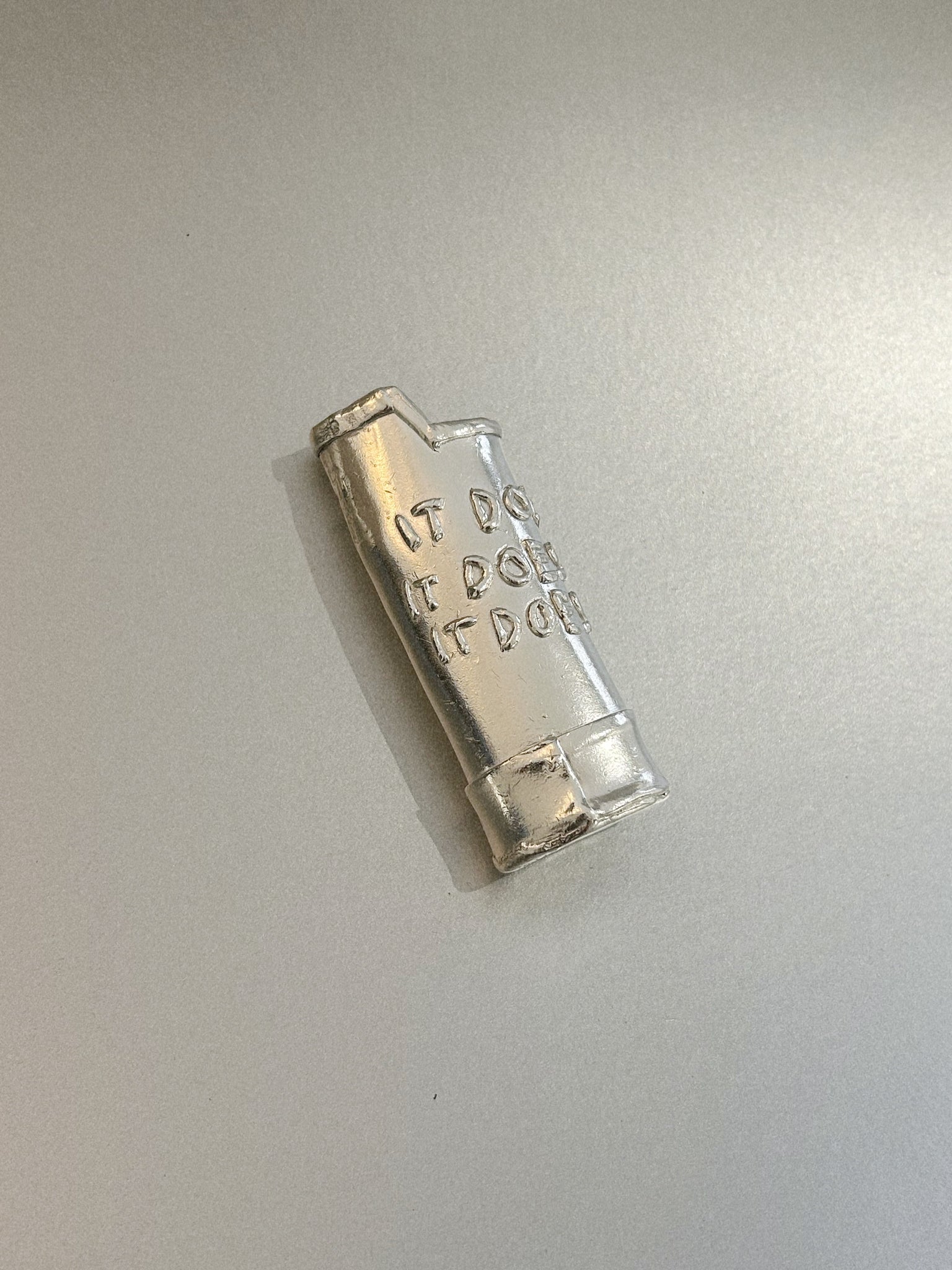 IT DOES – LIGHTER CASE