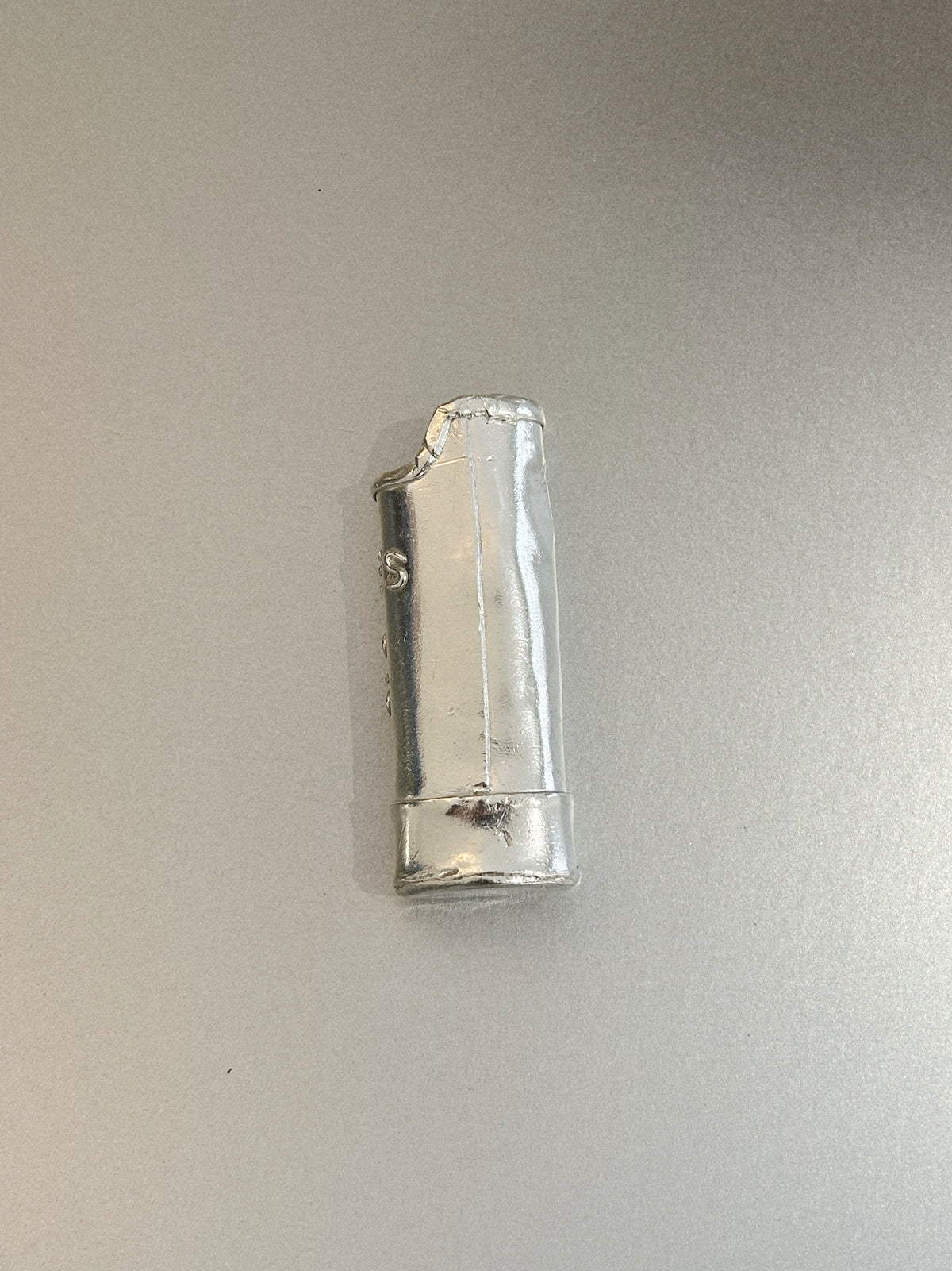 IT DOES – LIGHTER CASE
