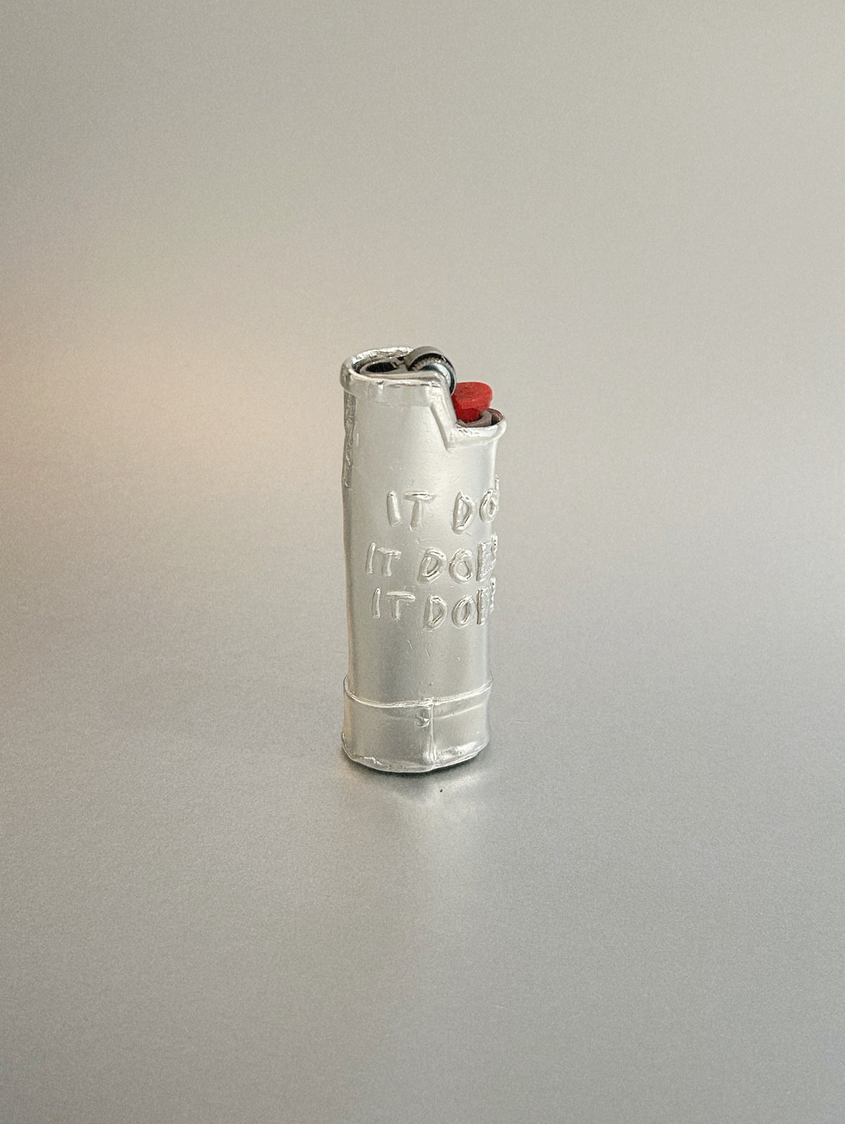 IT DOES – LIGHTER CASE