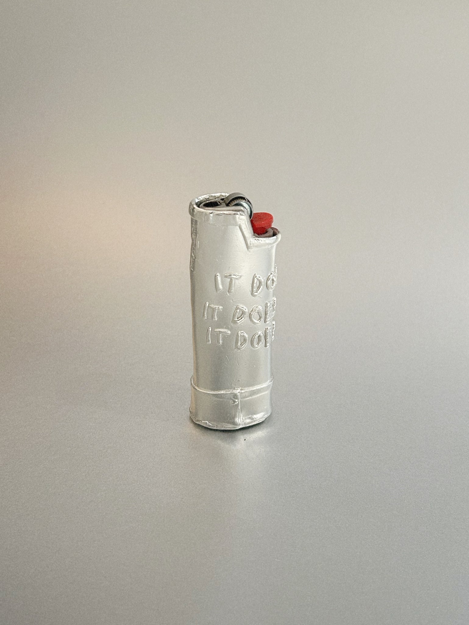 IT DOES – LIGHTER CASE